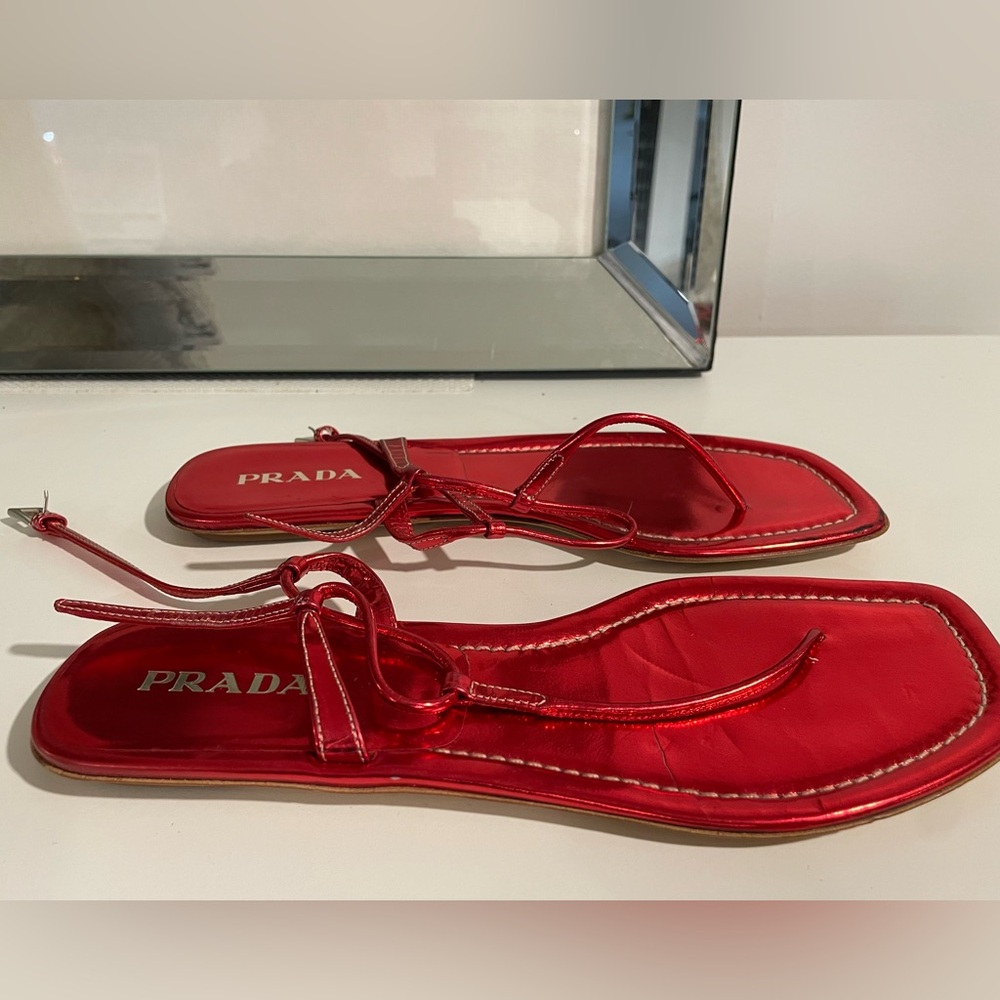 Prada  flat sandals.. vintage red metallic